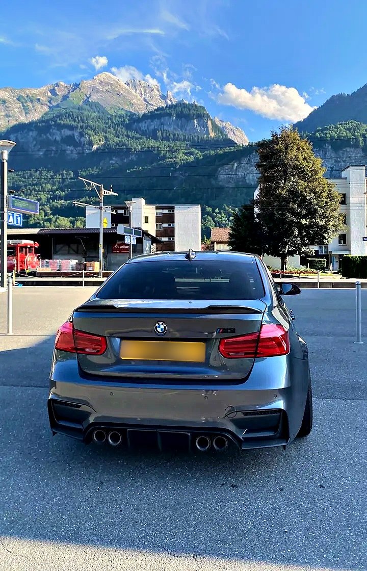 The car with its number plate blurred